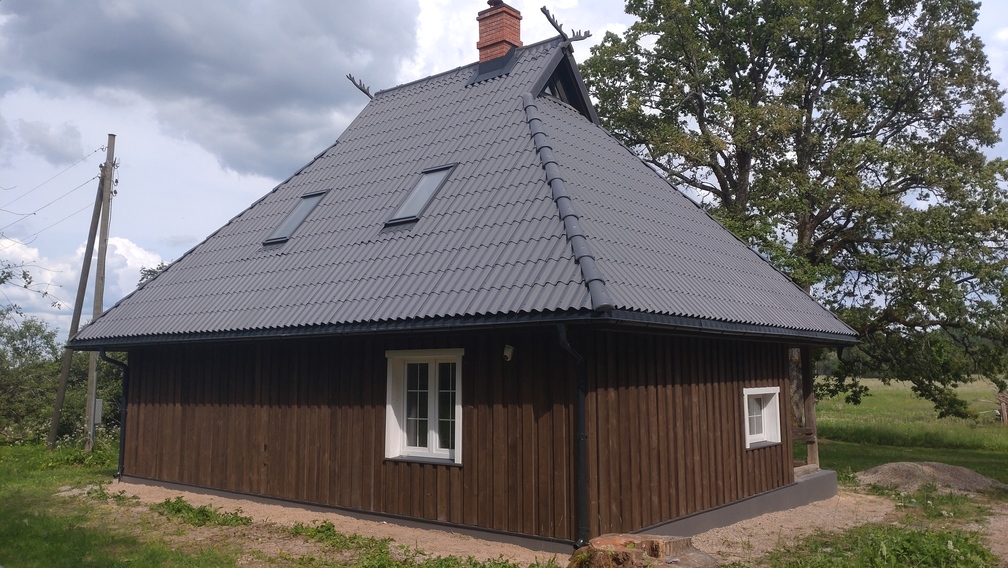 Koka mājas apdare
