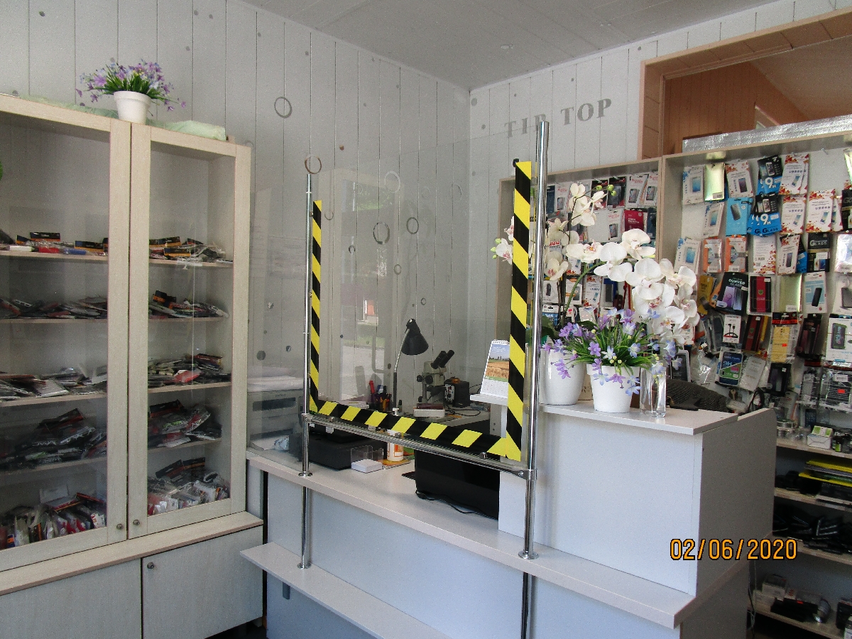 "Tip Top Telefons", veikals-darbnīca