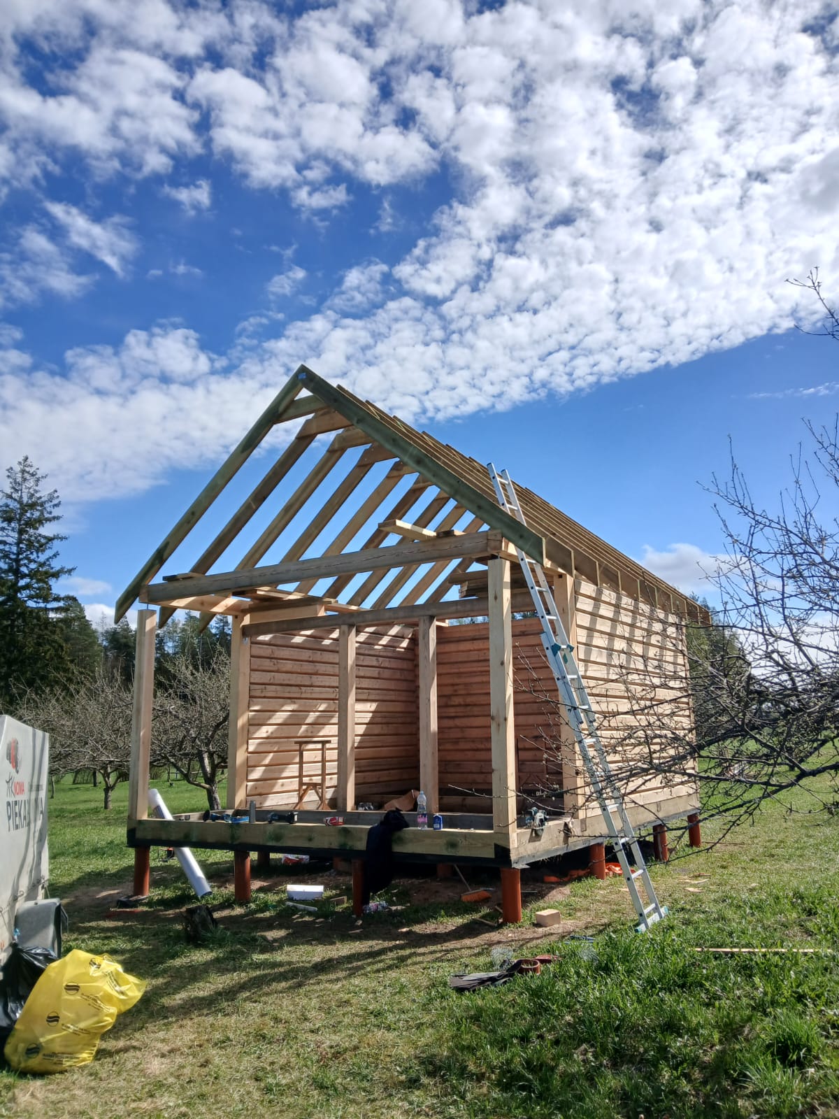 RAG, SIA, guļbaļķu mājiņa